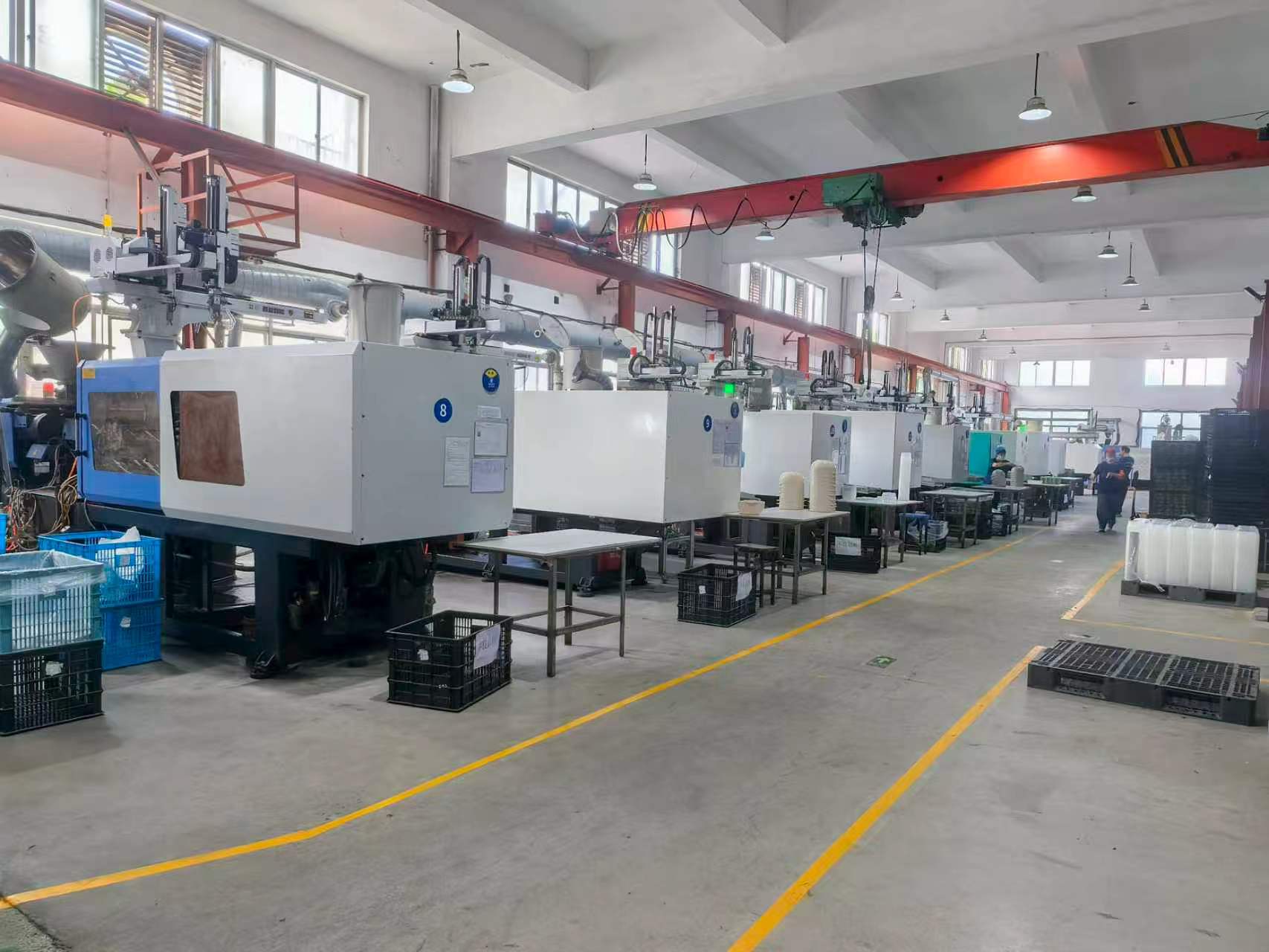 Row of injection molding machines